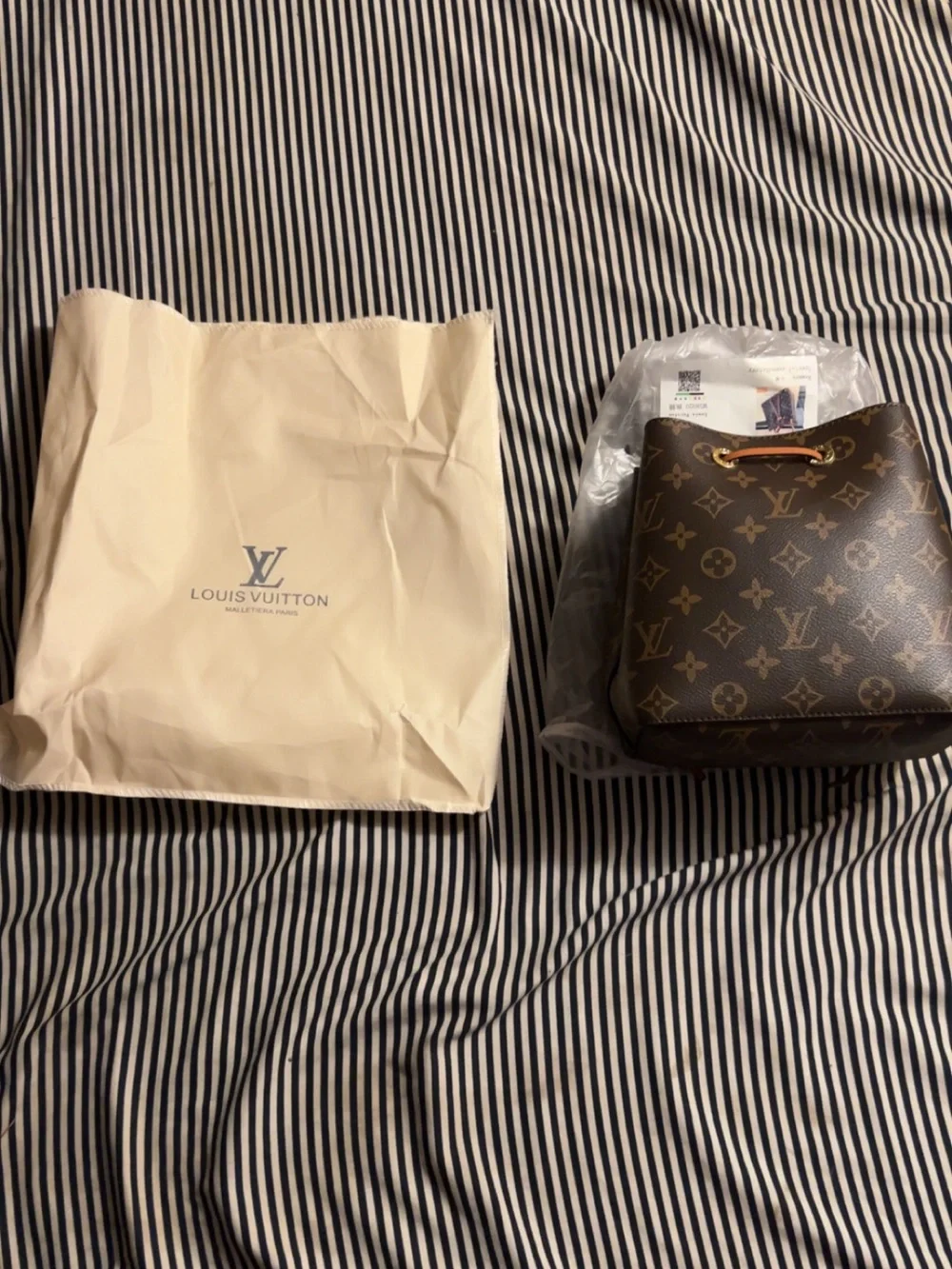 Louis Vuitton Monogram Drawstring Bucket Bag in Brown and Tan